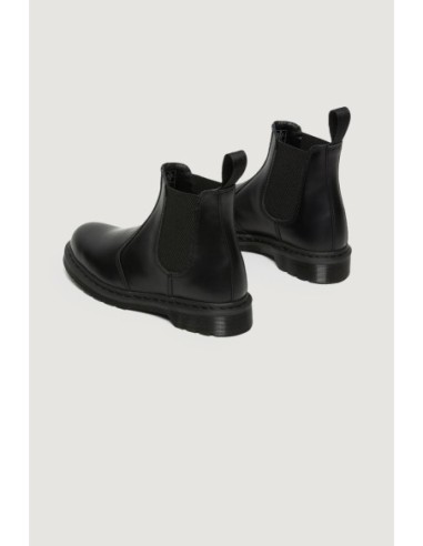 Dr. Martens Bottes Femme – Cuir noir, silhouette robuste