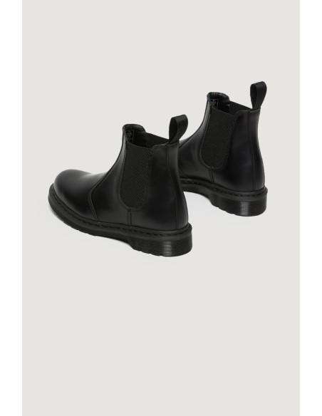 Dr. Martens Bottes Femme – Cuir noir, silhouette robuste